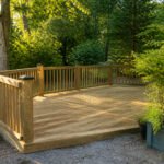 A partially constructed floating deck in a yard.